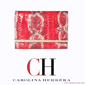 Queen Letizia carried Carolina Herrera Animal Print Clutch Bag in red