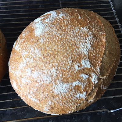 A round loaf where the score line has hardly expanded at all