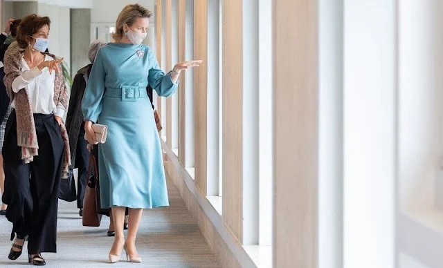 Queen Mathilde wore a turquoise, belted wool cashmere dress from Natan 2021 collection