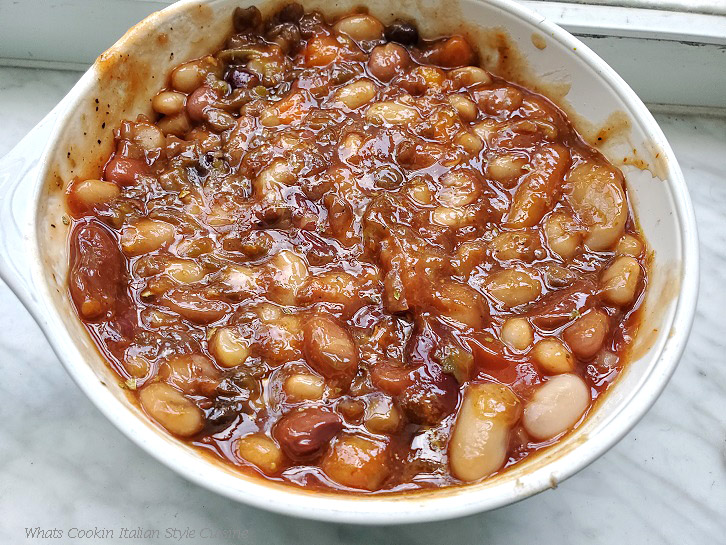 Old Fashioned 15 Beans Cowboy Style this is a slow cooked recipe in a big white bowl of barbecued cowboy style beans using 15 kinds of beans