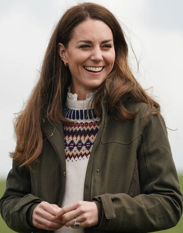 Kate Middleton wore a supersoft lambswool fair-isle jumper from Troy London, and longshore quilted jacket from Barbour