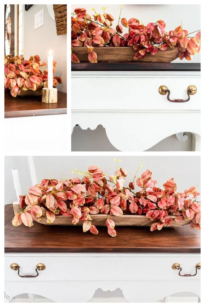 golden raintree coral blooms in wood dough bowl with candles