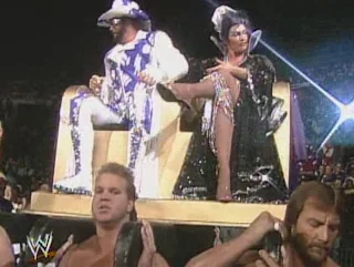 WWF / WWE - Wrestlemania 7: Macho King Randy Savage and Sensational Queen Sherri were carried to the ring by WWF jobbers
