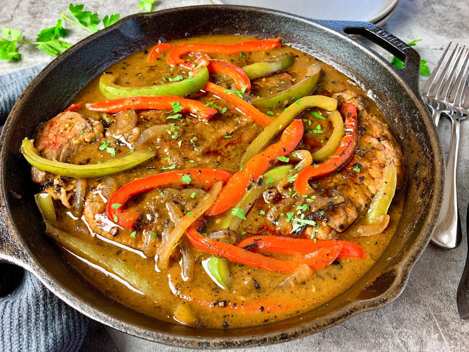 Smothered Steak with Onions and Peppers