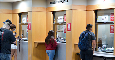 Image: Students receiving their Higher Education Emergency Relief Fund of the American Rescue Plan Act.