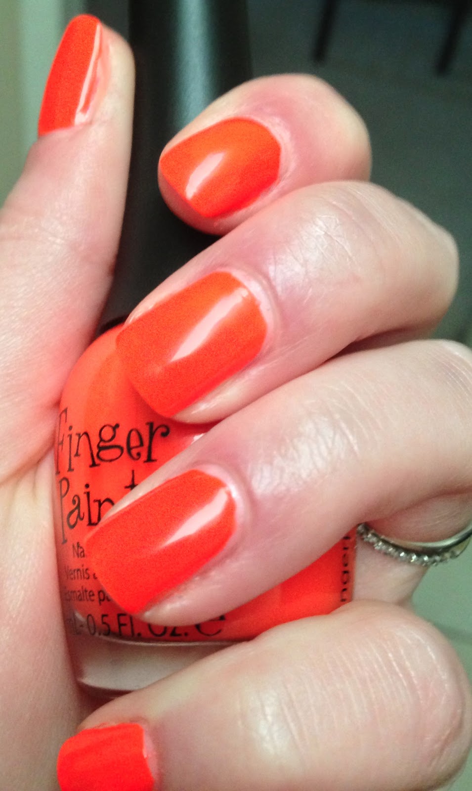 Polish Off the Bottle Shot of the Day Finger Paints Iconic Orange