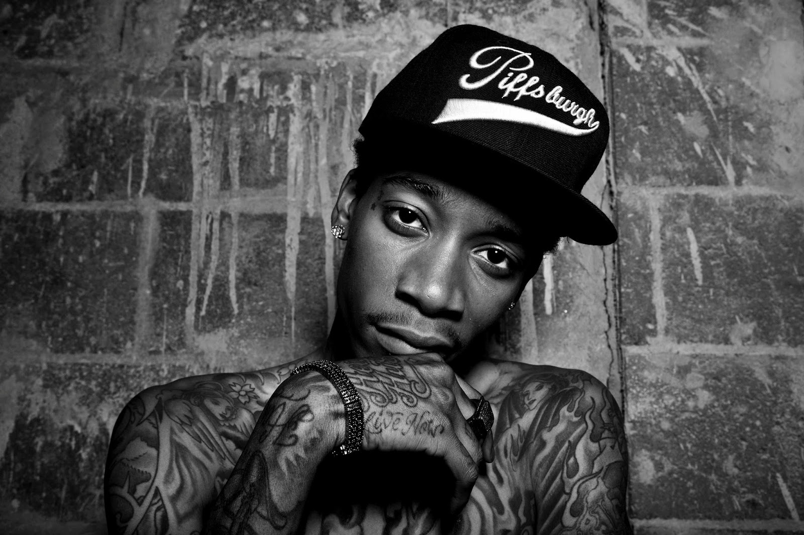 Music Hits Factory Listening to Wiz Khalifa