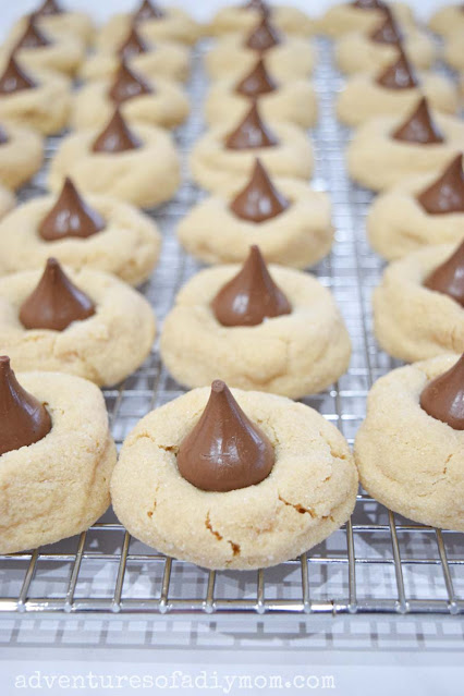 peanut butter blossom cookies on a wire rack