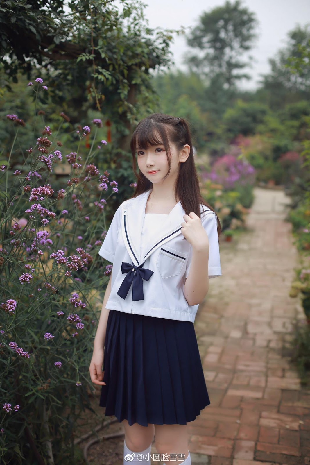 Chinese cute model - Little girl in the flower garden
