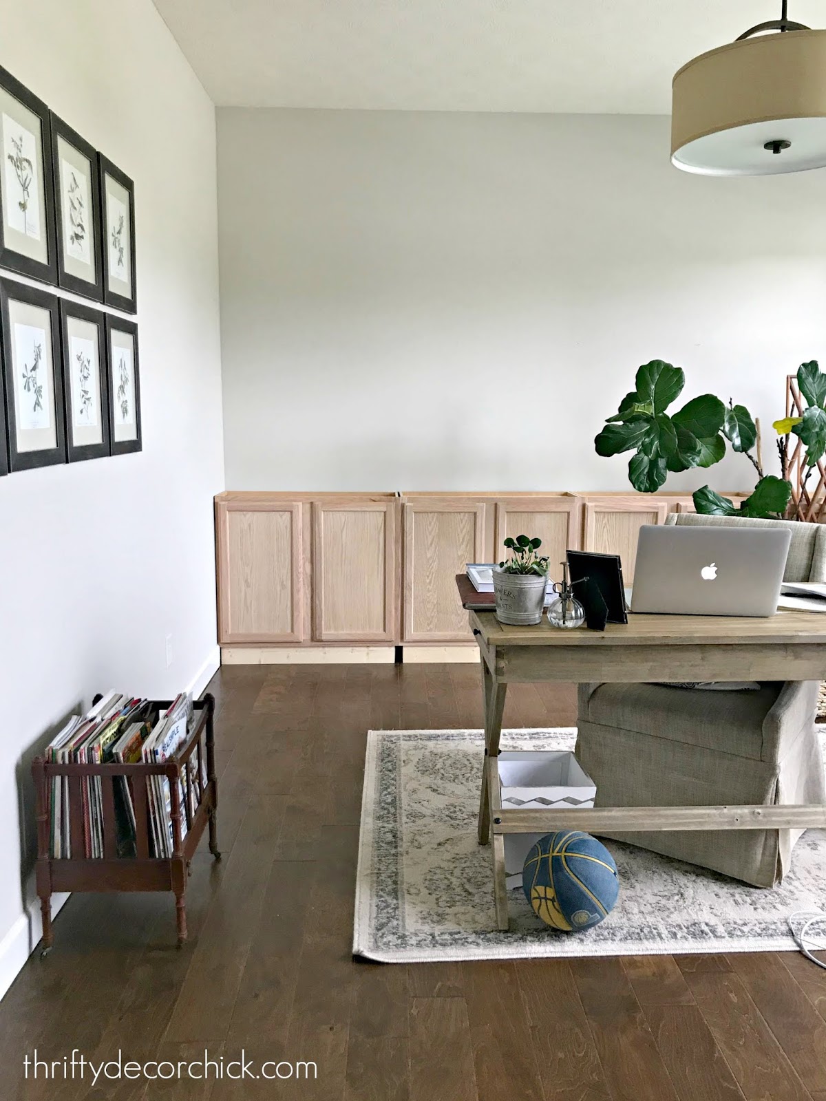 Bookcase wall using kitchen cabinets 