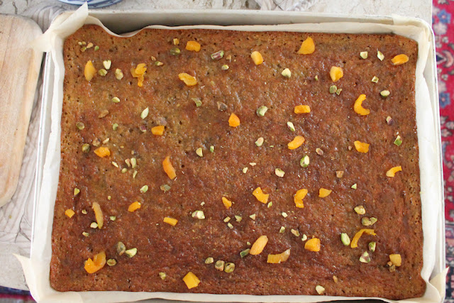 Food Lust People Love: Sweet chewy dried apricots and flavorful roasted pistachios combine with lots of creamy yogurt and butter to create one of the richness cakes you can imagine. A hint of cardamom in the batter is echoed again in the orange-cardamom syrup to finish the cake with a Middle Eastern flair.