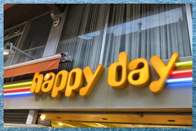 Happy Day Neon Sign in Lloret de Mar, Costa Brava, Spain