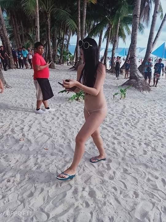 A Taiwanese tourist in her 20s was arrested on Wednesday (Oct 9) after photos of her wearing a string bikini deemed to be overly skimpy on Boracay's conservative shores went viral.