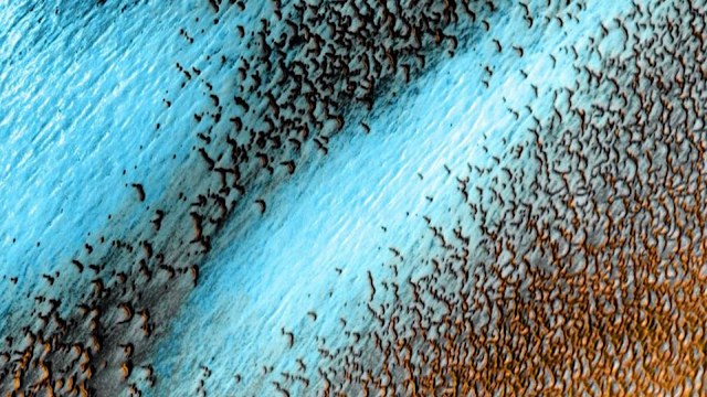 Colour photos of Mars polar cap of blue sand dunes.