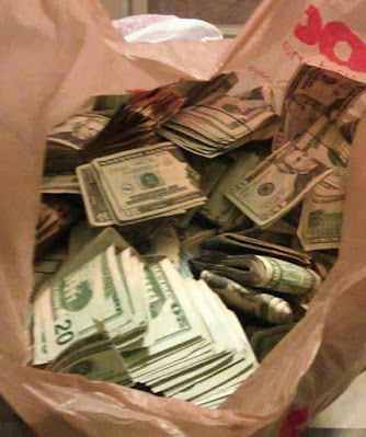 dollars inside a bag