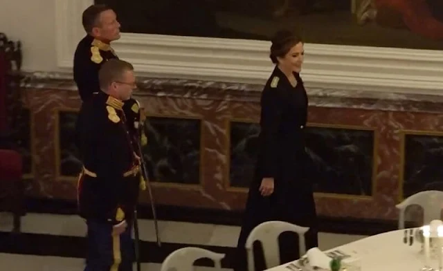 Crown Princess Mary wore the official uniform worn by Danish female navy officers. Queen Margrethe wore a lace tulle gown