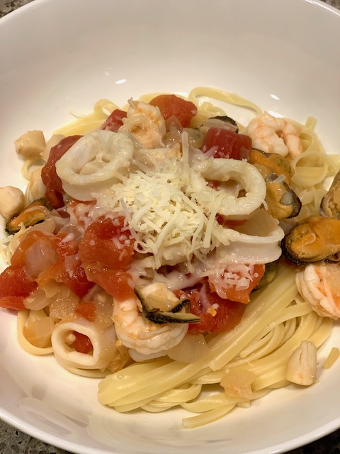 Seafood Pasta with Tomato and Onion Sauce