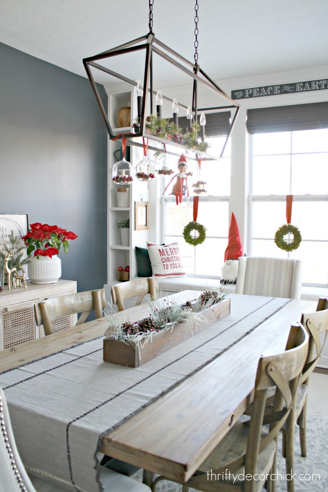 Window seat in dining room with built ins