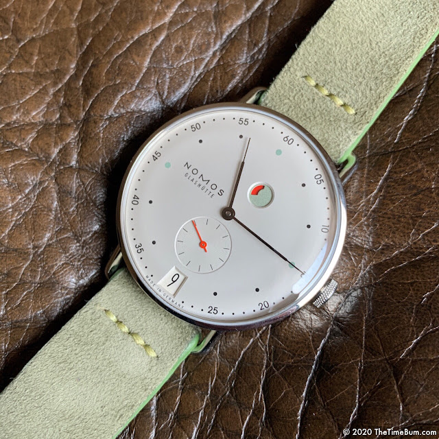 Nomos Metro Gangreserve on Paul Twice La Mancha olive Suede Strap