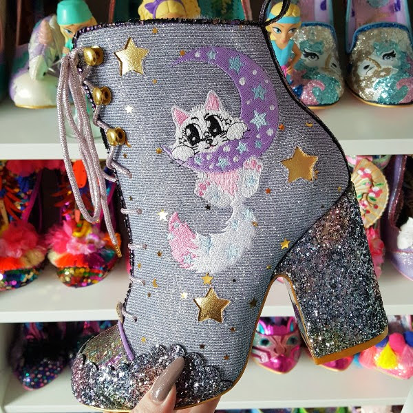 embroidered cat on moon on side of ankle boot