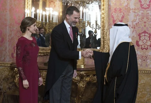 Queen Letizia attends the annual Foreign Ambassadors reception at the Royal Palace. Queen Letizia wore Felipe Varela Long sleeve dress in red diamond earrings