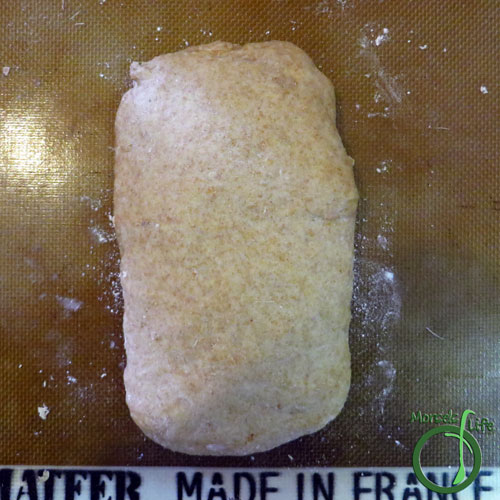 Morsels of Life - Pesto Swirl Bread Step 6 - Roll up dough, and seal seam. Place seam side down, and bake at 350F for 45 minutes.