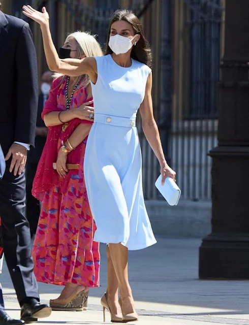 Queen Letizia wore a sky light blue sleeveless midi dress from Pedro del Hierro, and camel leather pumps from Prada