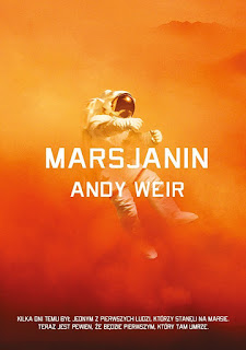 Okładka książki Marsjanin - kosmonauta na pomarańczowym, zamglonym tle