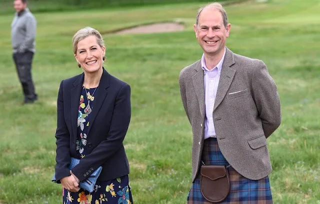 The Countess of Wessex wore a new floral stretch silk crepe midi dress from Etro. The Countess carried Sophie Habsburg clutch