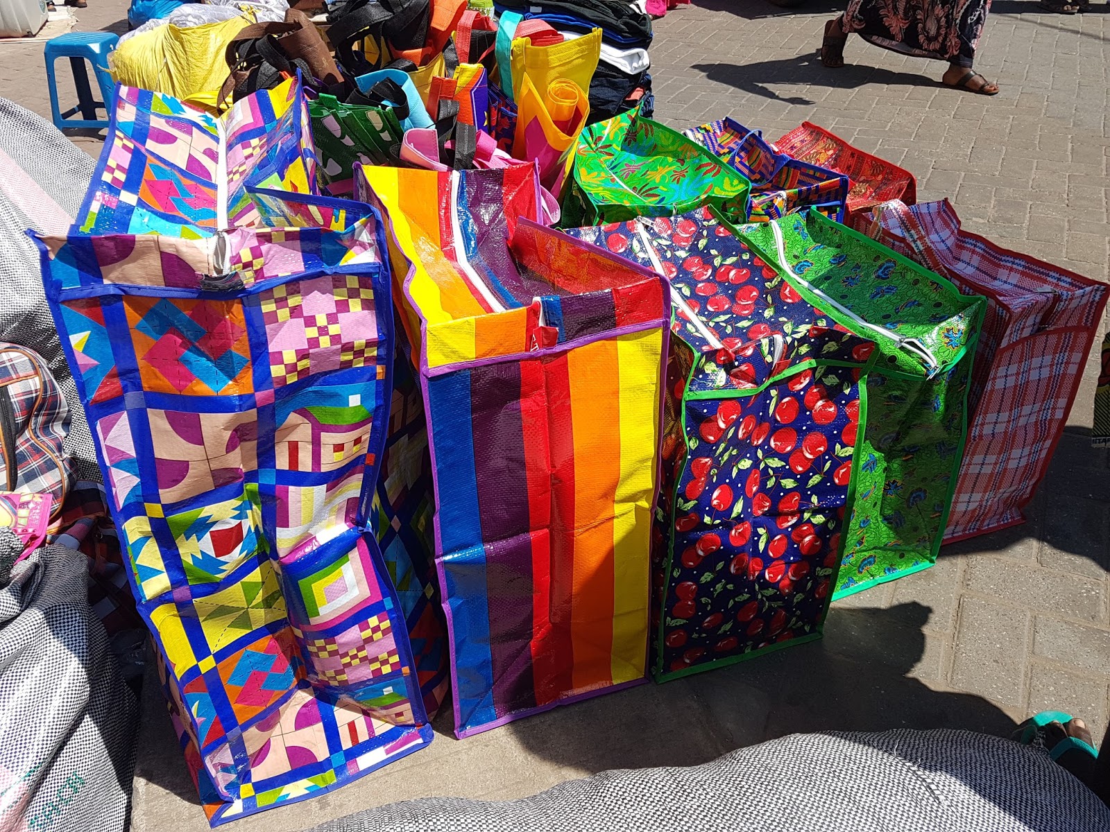 Charlotte... on the go! 'Ghana must go' bags