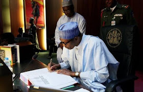 President Buhari signs eight new bills into law