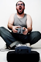 Excited adult male video gamer