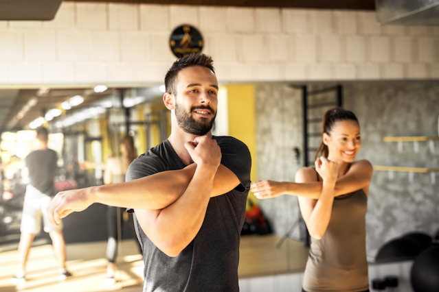 People stretching before a military workout