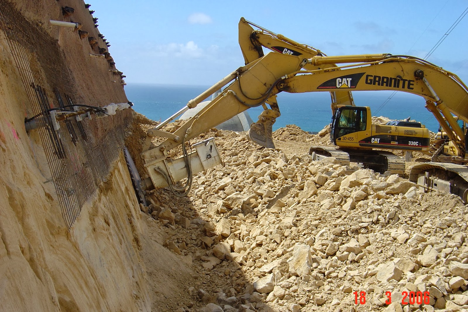 Excavator rock Saw Rock Tools cutting California