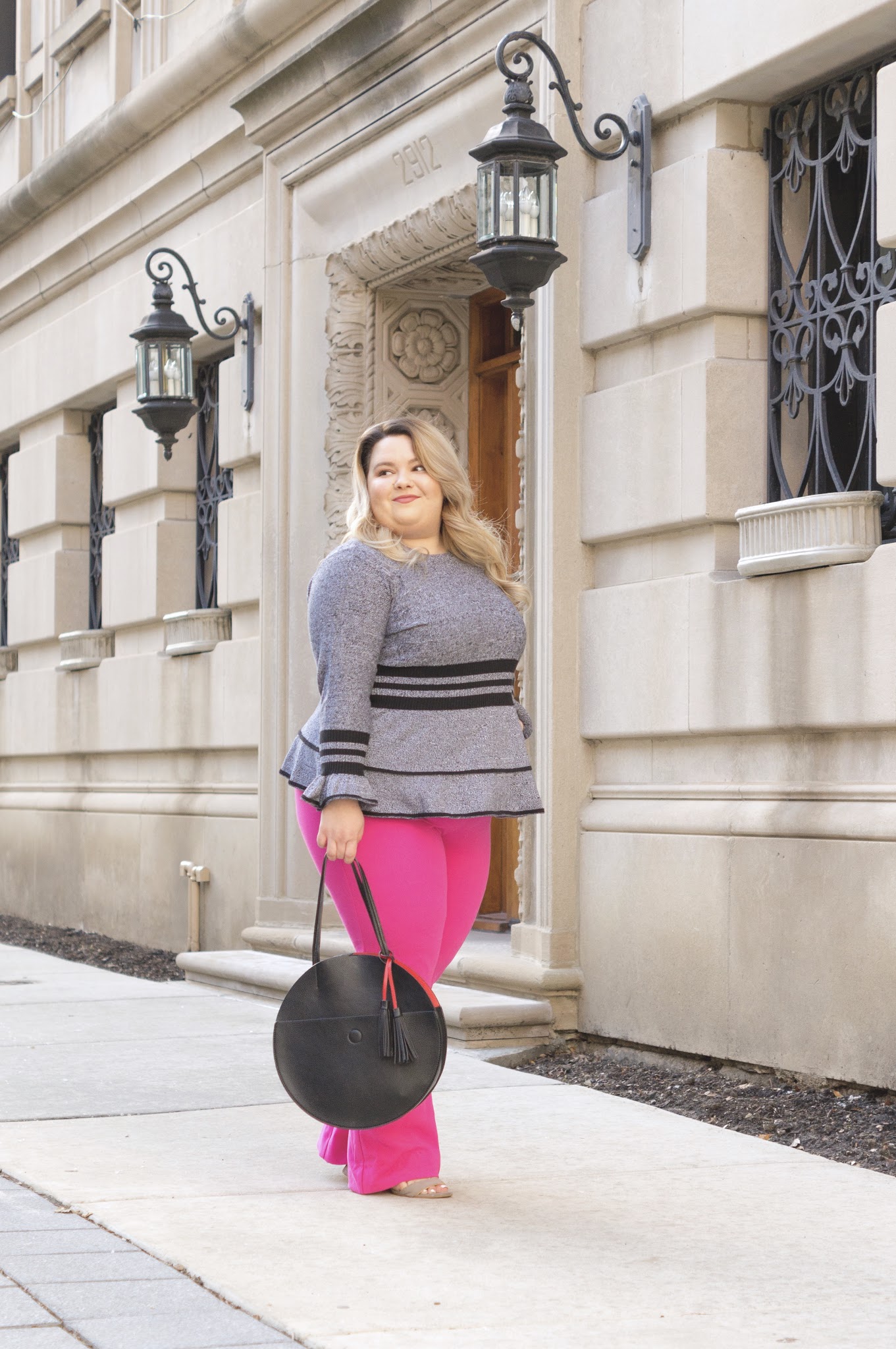 Chicago Plus Size Fashion Blogger Natalie in the City reviews Eloquii's sweaters and the Victoria Beckham for Target Fuscia Twill Flared Trousers.