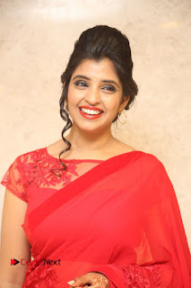 Actress Shyamala Stills in Red Saree at Okkadochadu Movie Audio Launch  0339