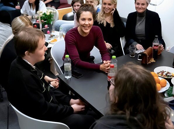 Crown Princess Mary visited Kræftværket at Rigshospitalet (National hospital) in Copenhagen. Zara burgundy sweater