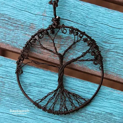 http://www.doodlecraftblog.com/2015/03/wire-wrapped-tree-of-life-pendant.html