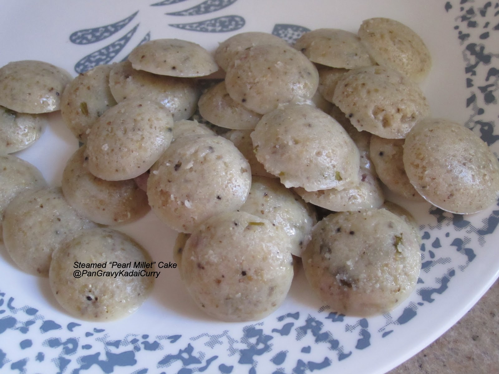 Pan Gravy Kadai Curry Steamed PearlMillet Cakes "Bajra/Kambu Idli" With Smashed Eggplant and