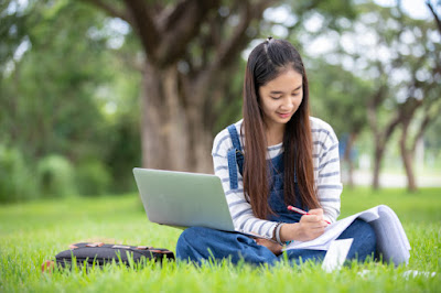 beautiful-asian-girl-student-holding-books-smiling-learning-education-park-summer-relax-time_33718-1497.jpg