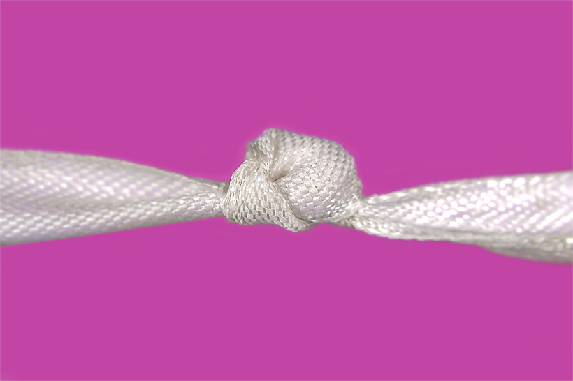 Magiczny skill - biały węzeł na różowym tle