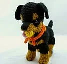 http://www.ravelry.com/patterns/library/rottweiler-puppy-accessories