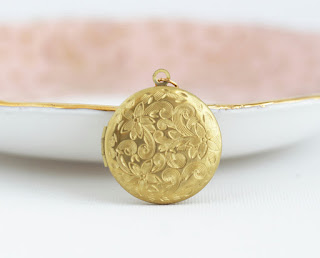 http://www.jacarandadesigns.com/collections/lockets/products/floral-locket-necklace-gold-locket-picture-long-locket-necklace-wedding-locket-gold-photo-locket-long-necklace-gold-vintage