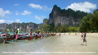 Longtail boats on shore at Railay West - walking to shore