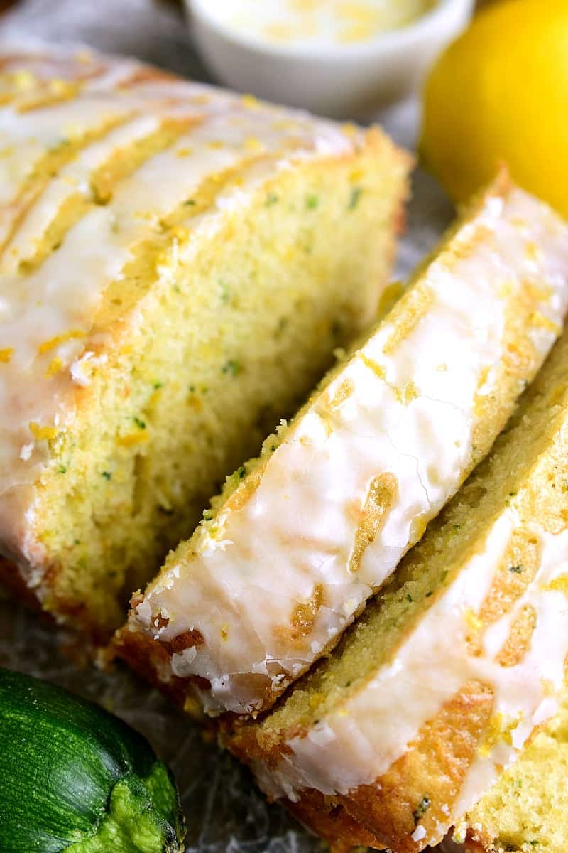 This Lemon Zucchini Bread combines two favorites in one delicious loaf of bread! Topped with a sweet lemony glaze, it's a great way to sneak in extra veggies and the BEST way to wake up!