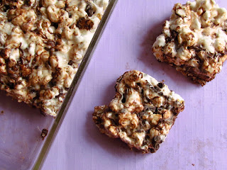 overhead shot of popcorn cereal treats on purple background