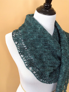 http://www.ravelry.com/patterns/library/candeo-shawl-boomerang-style