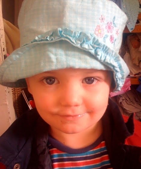 boy in girl hat