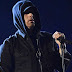 Eminem Draws Criticism for Using Realistic Gunshot Sounds During Bonnaroo Performance 