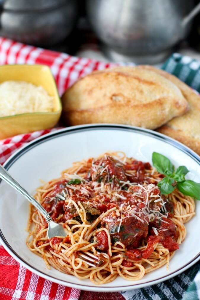 Slow Cooker Spaghetti and Meatballs Florentine with basil